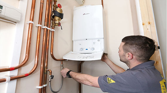 Skilled heating engineers installing complete heating systems for residential properties.