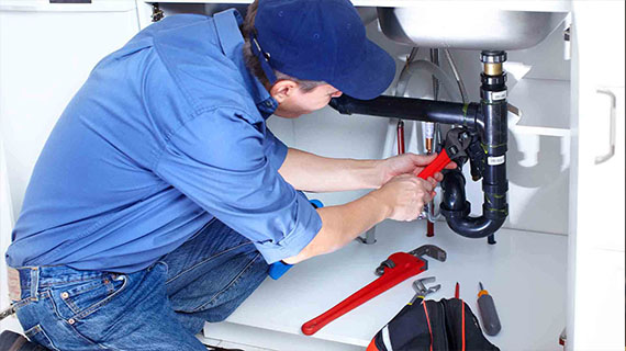 Plumbing installation Plumbing service showing pipes, fittings, and installation work.