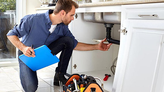 Plumbing installations around the home Plumbing installation with tools and pipes.